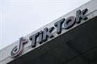 Image of a building with the TikTok logo